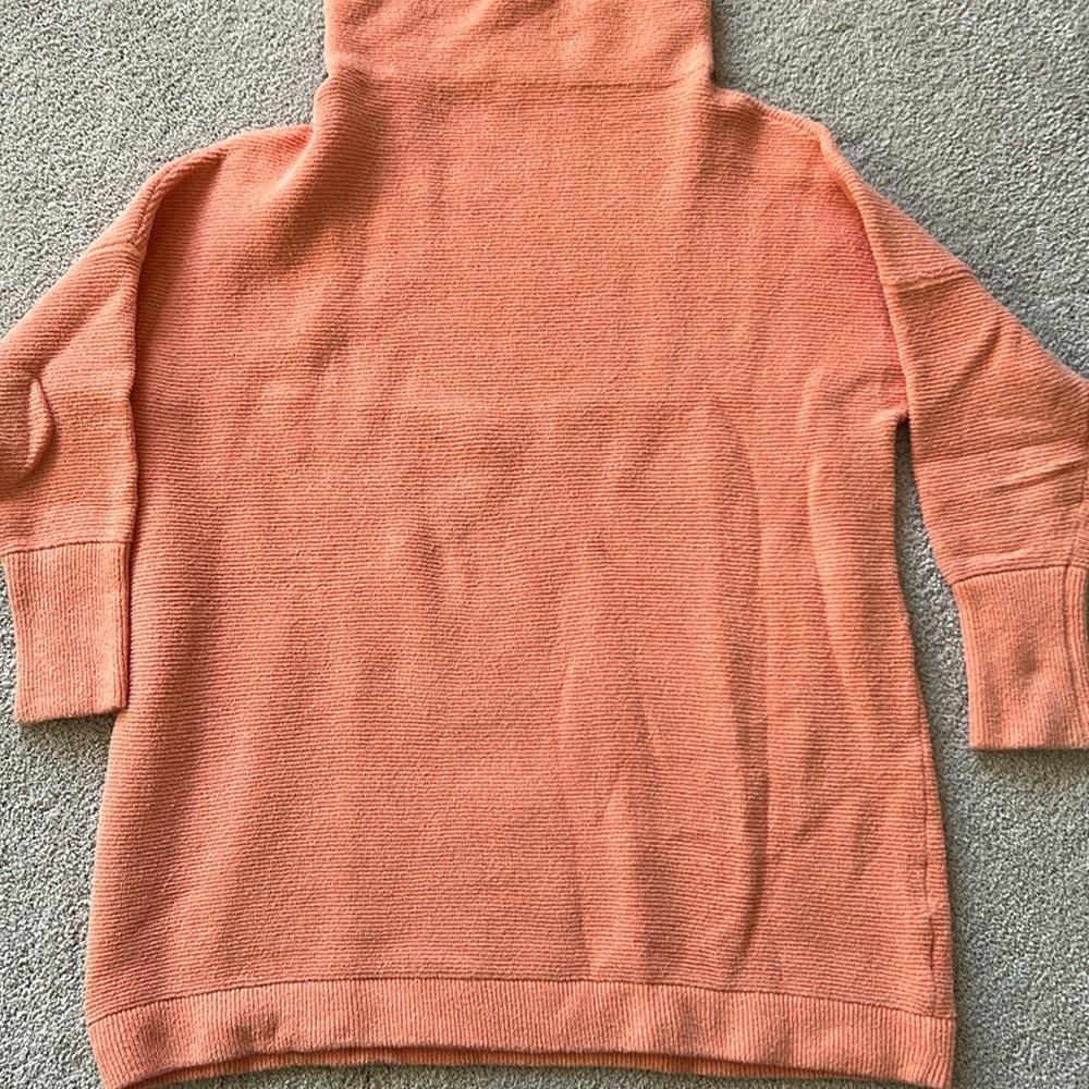 Free People peach color sweater.